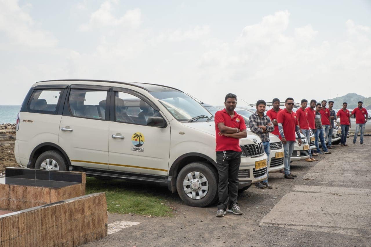 The Tropical Andamans driver team lined up with the fleet in Port Blair