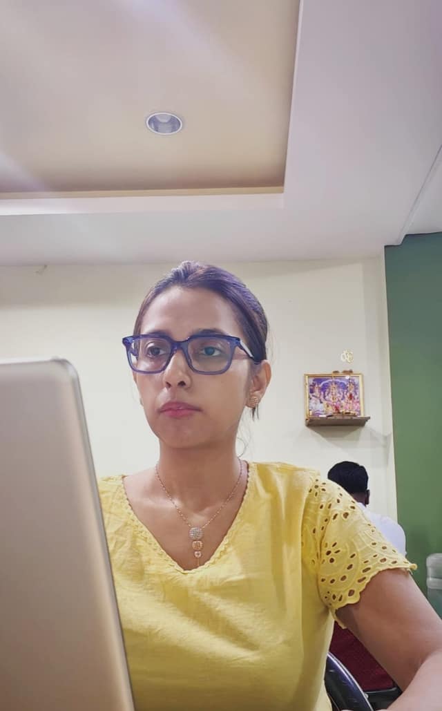 Varthika, tour planner at Tropical Andamans, working at the office in Port Blair